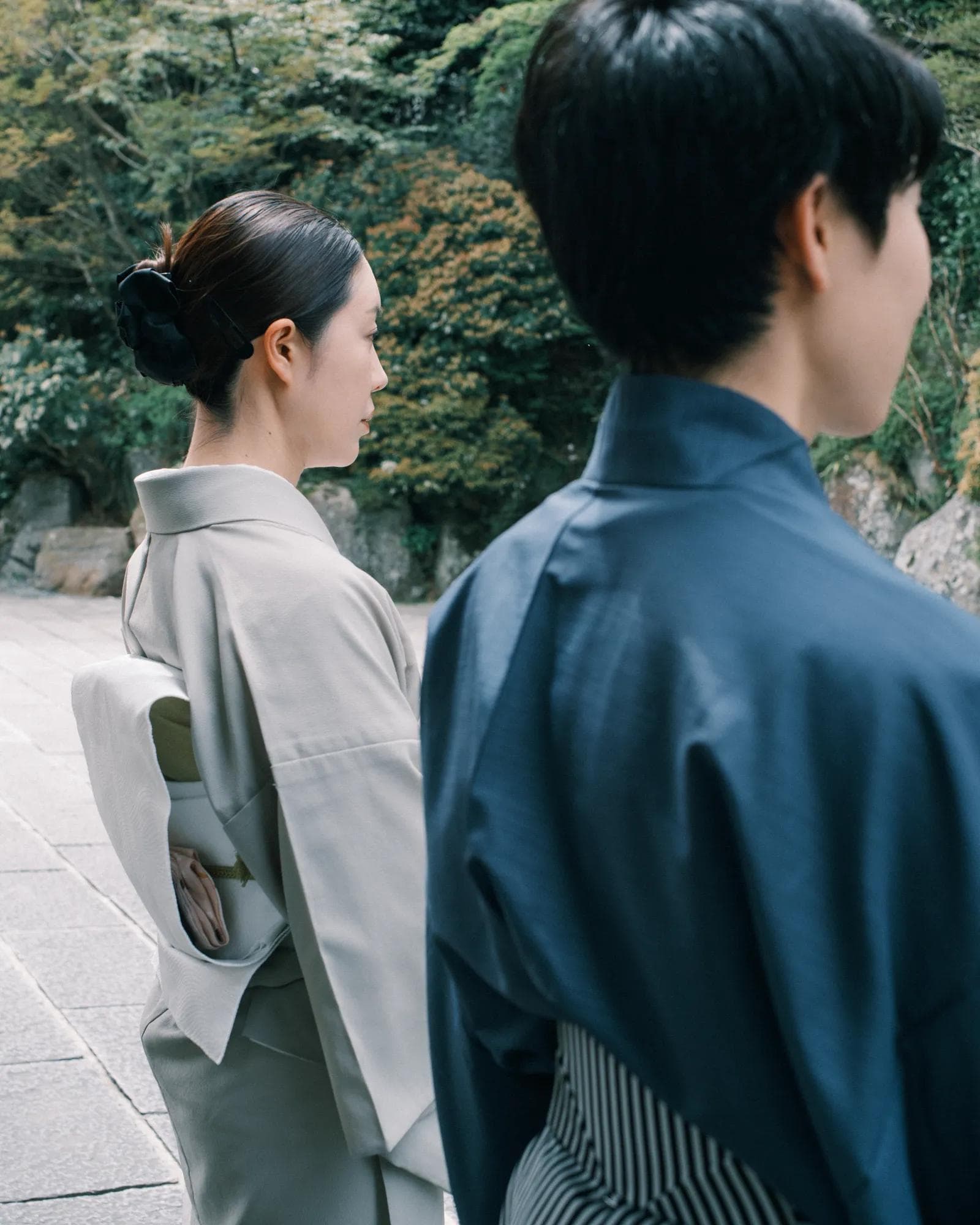 Japanese woman and man wearing traditional kimonos